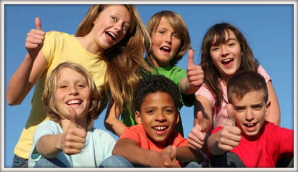 Happy kids with thumbs up
